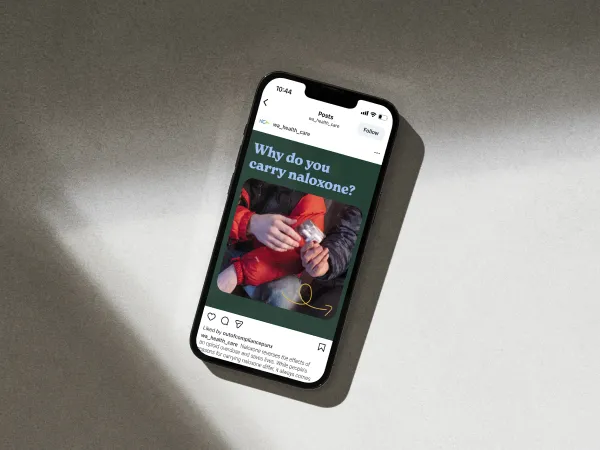 image of a phone with Friends For Life information